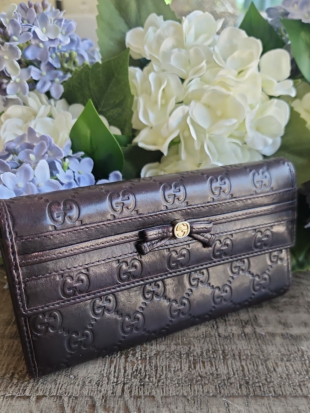 Gucci Black Embossed GG Continental Wallet with Bow Detail. Perfect FALL color